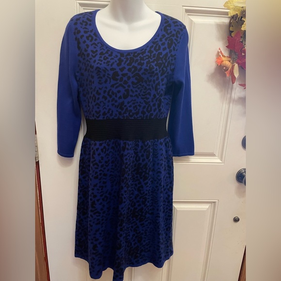 Spense Medium Midi Length knit Dress in a black and royal Blue print. - Picture 2 of 11